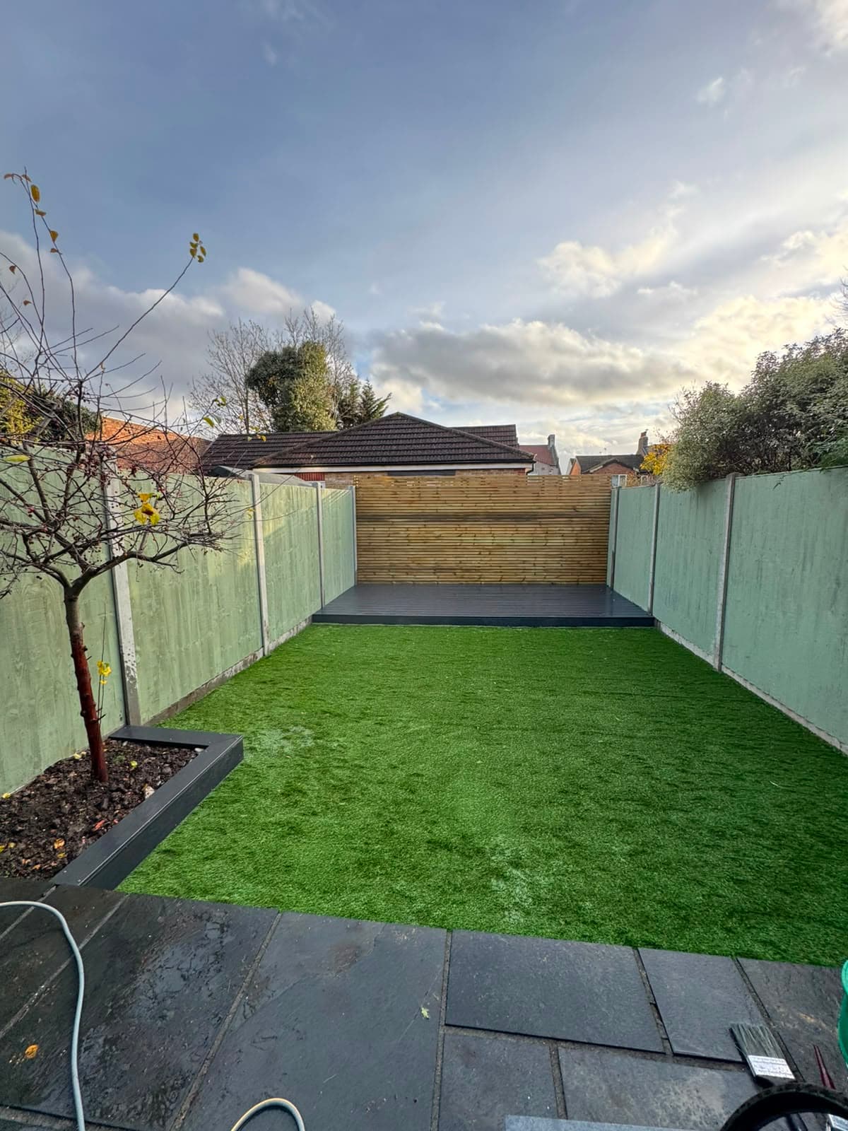 The finished garden with new boundary and lawn